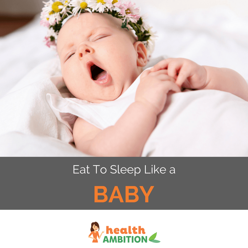A yawning baby in bed with the caption "Eat to Sleep Like a Baby."