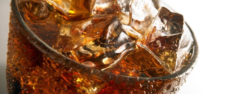 Close-up of a glass of soda with ice.