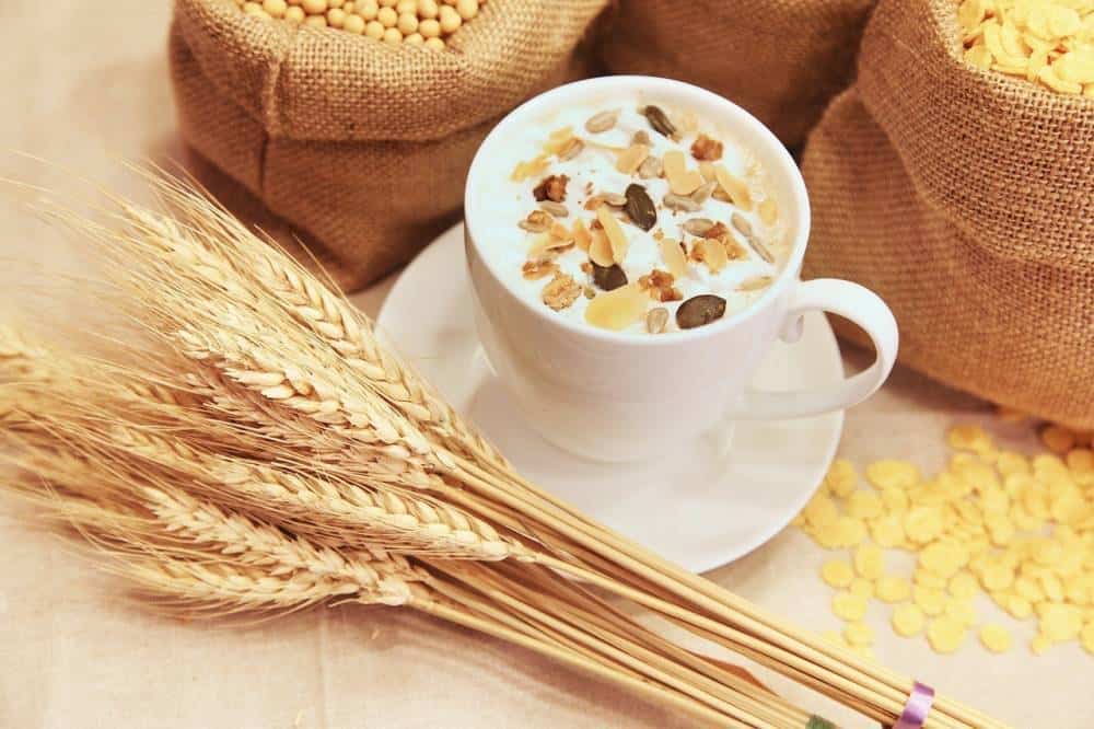 A cup of cereal with wheat.