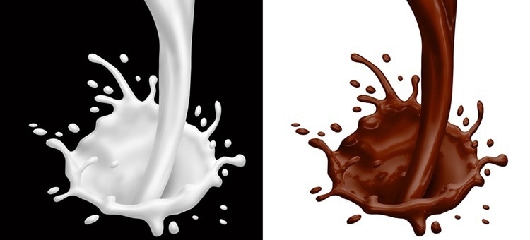 Milk and dark chocolate in front of a black and white background.