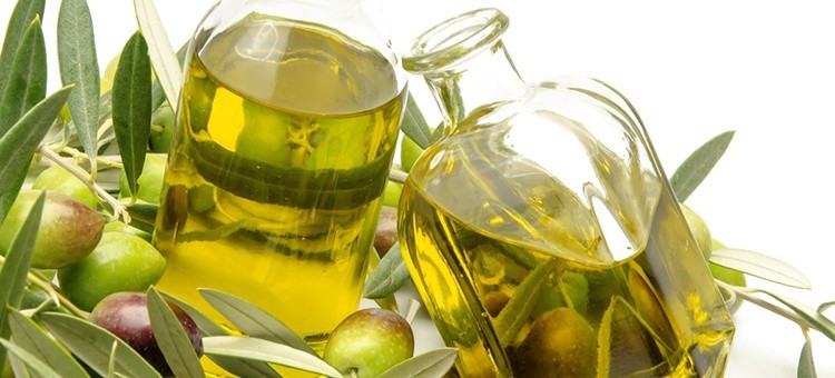 Two bottles of olive oil.