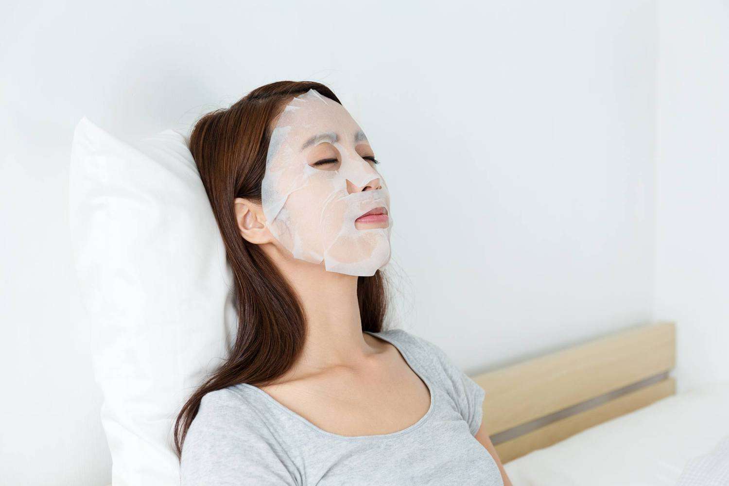 A woman wearing a face mask for treatment.