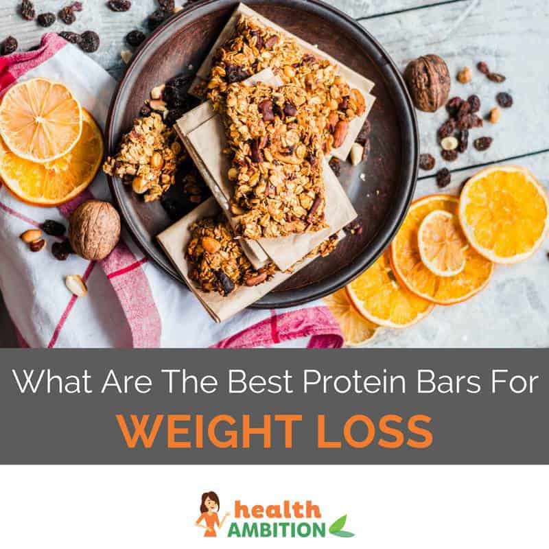 Protein bars on a plate with the title "What Are The Best Protein Bars For Weight Loss"